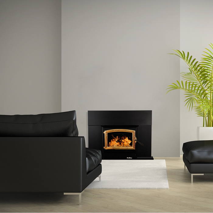 Buck Stove Model 21 Non-Catalytic Wood-Burning Fireplace Insert with Gold Trim in Modern Home