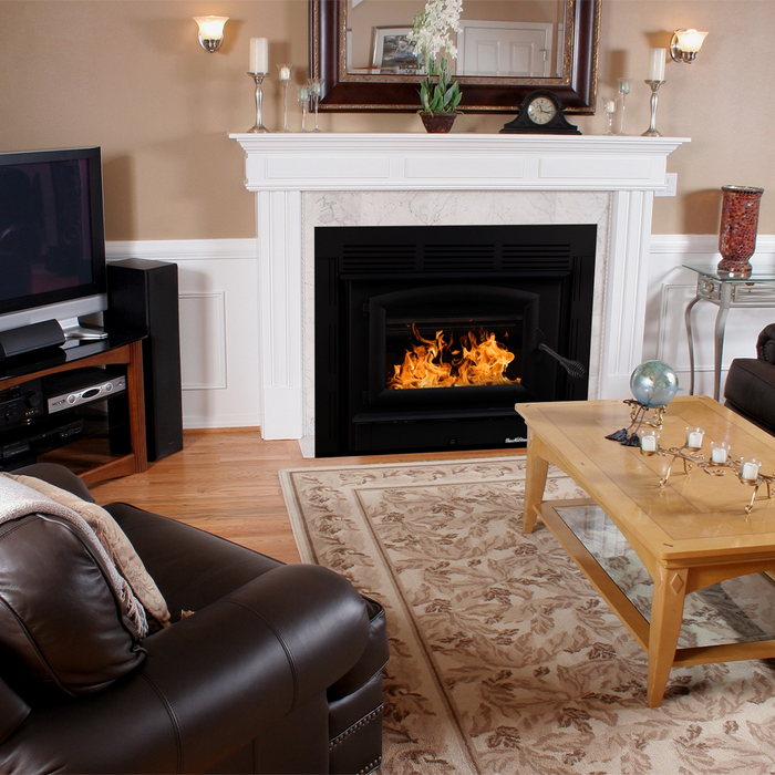 Buck Stove Model 74 Zero-Clearance Non-Catalytic Wood-Burning Fireplace Insert with Black Door Trim in Living Room