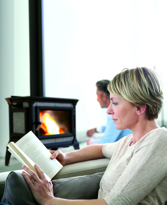 Hearthstone Heritage Wood Stove with Matte Black Finish in Background