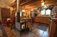 Hearthstone Stoves Lincoln Freestanding Wood Stove Centrally Located in Small Cabin