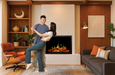 Couple dancing in front of Orion V2 Traditional Electric Fireplace