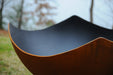 Fire Pit Art Manta Ray outdoor fire pit with iron oxide patina
